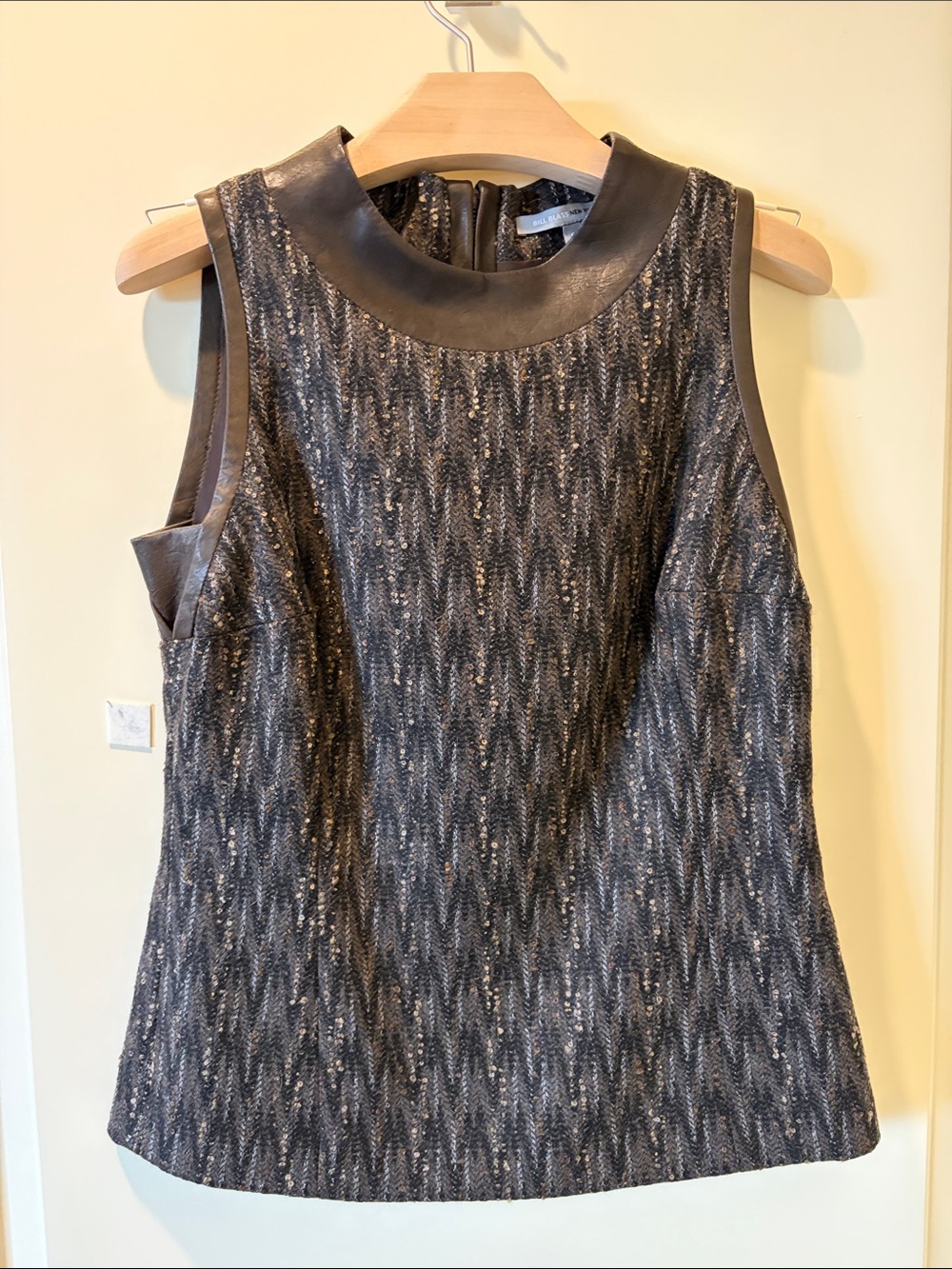 Sleeveless Metallic Charcoal Shift Dress with Leather Trim
BILL BLASS